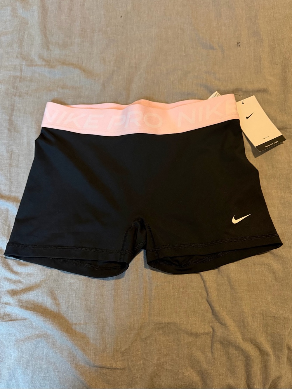 Nike Pro Women's Black Shorts with Pink Waistband